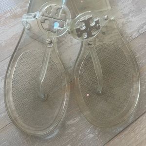 Tori Burch clear jelly sandals.